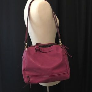 Rose adjustable strap purse.